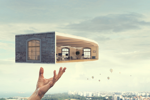 Floating architecture above cityscape
